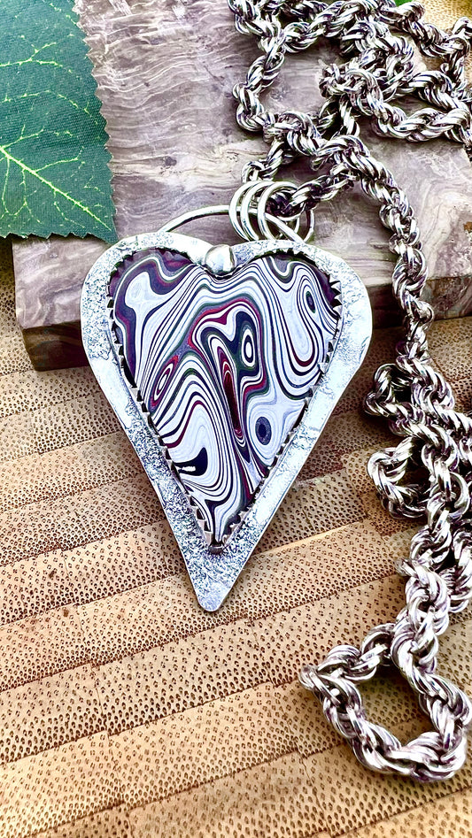 Fordite Pendant.