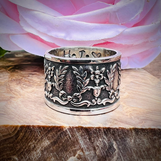 "SAM" Embossed Silver Band.