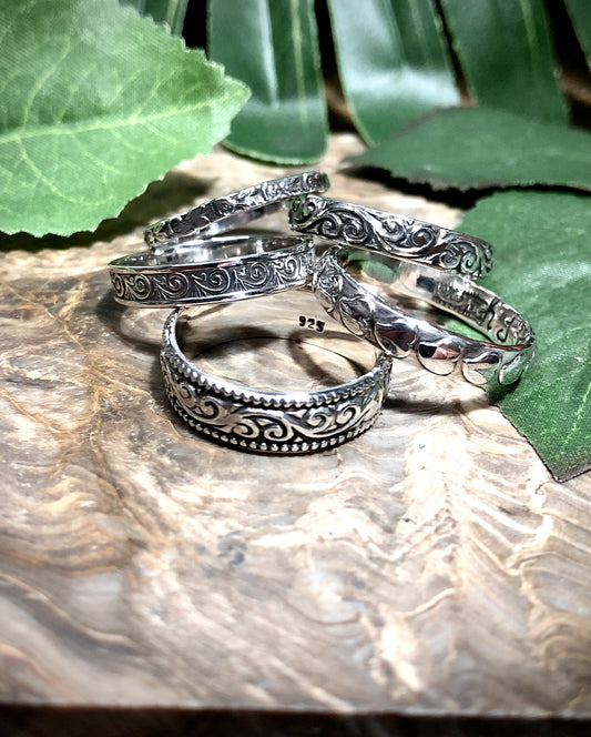 Assorted Silver Patterned Bands.