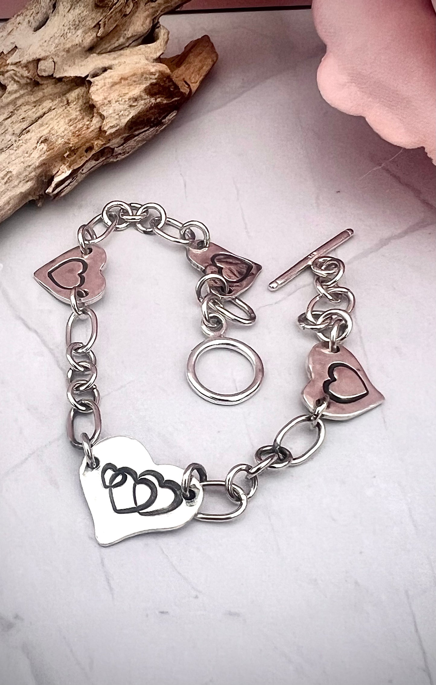 ‘four of Hearts'  Sterling Silver Bracelet.