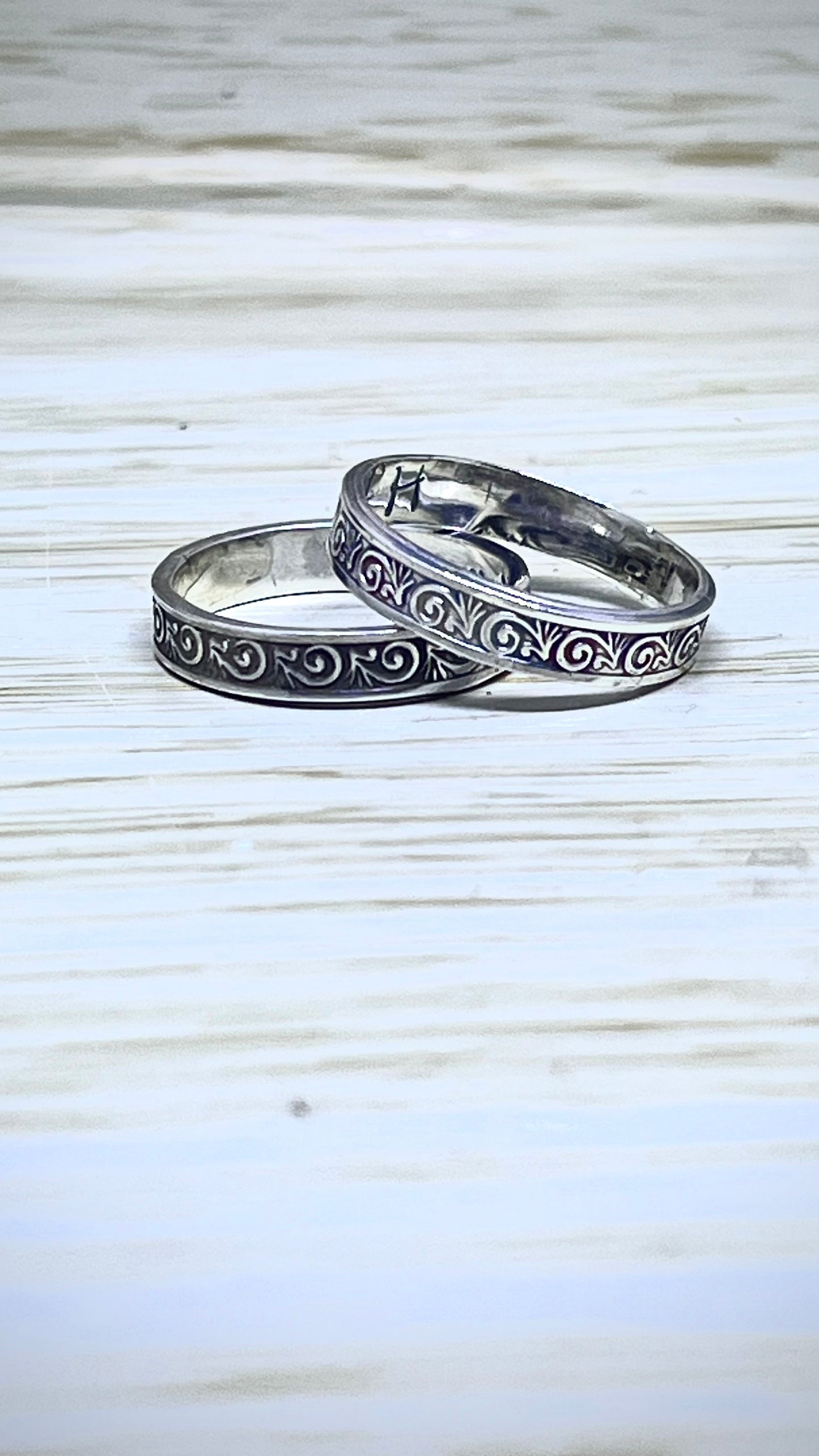 Assorted Silver Patterned Bands.