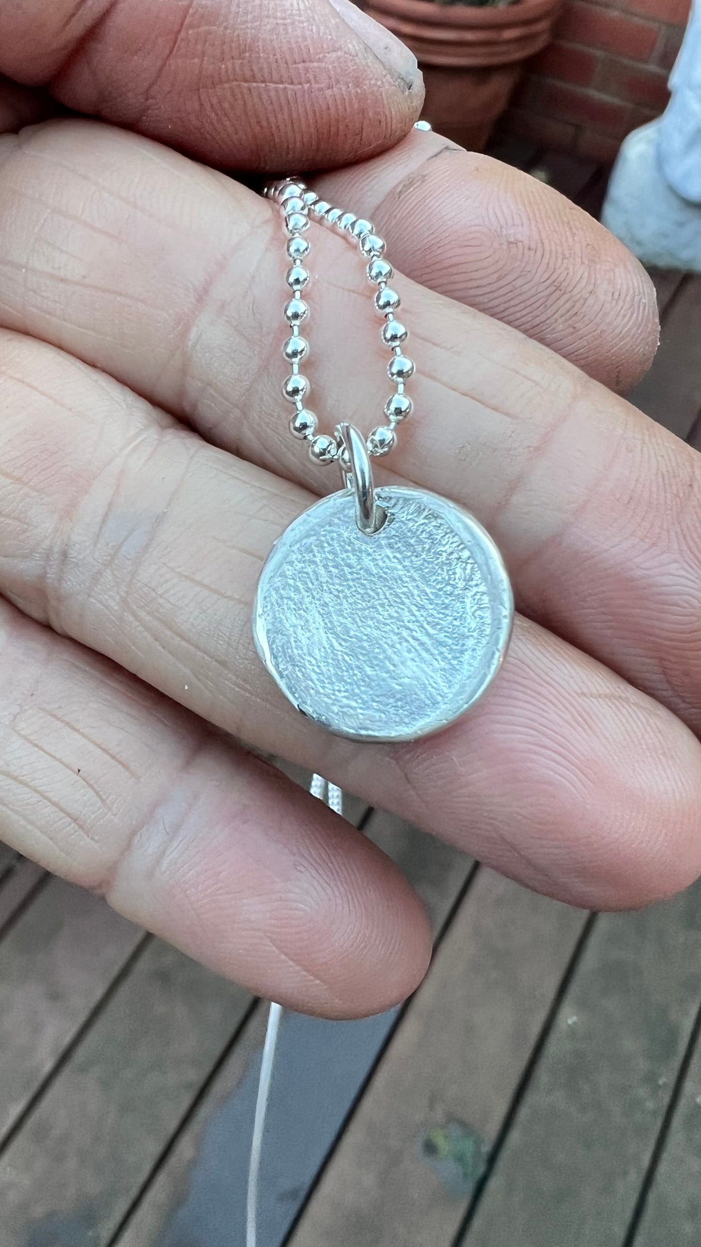 Fingerprint Pendants.